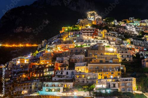Colorful houses of Positano along Amalfi coast at night, Italy.