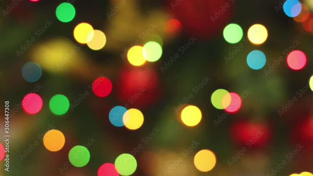 Close up looping stop motion animation of Christmas lights blinking on Christmas tree Close up looping stop motion animation of Christmas lights blinking on Christmas tree