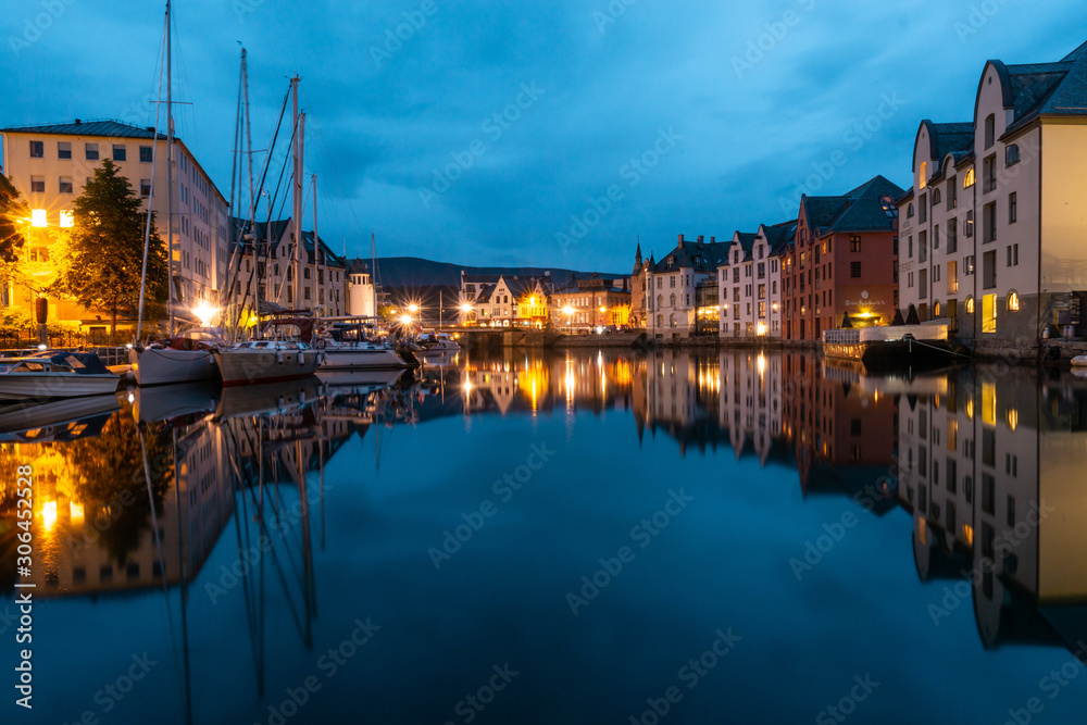 Night city Alesund, mirrored water
