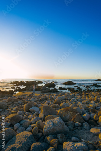 sunset on rocky coast of the sea © Amy Buxton