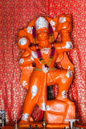 A deity of Hanuman, the Hindu monkey god in a small shrine in Gangotri, India. photo