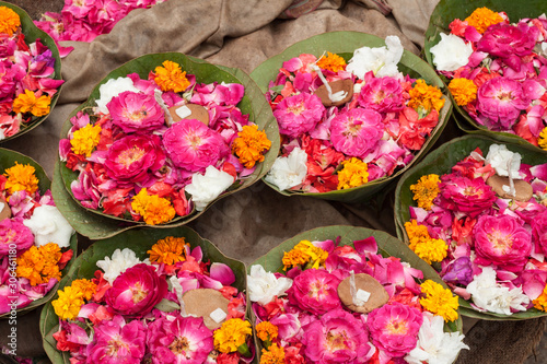 Flowers and lamps on sale in Haridwar for the worship of Goddess Ganga.