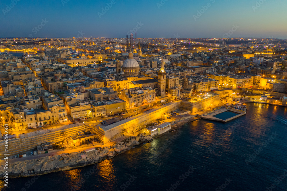 Valletta city - capital of Malta. Aerial view, evening, church Valletta city - capital of Malta. Aerial view, evening, church