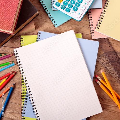 Student's desk with blank books