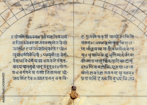 An astronmical text in the Sanskrit language etched in marble at the Jantar Mantar observatory in Jaipur, India. photo