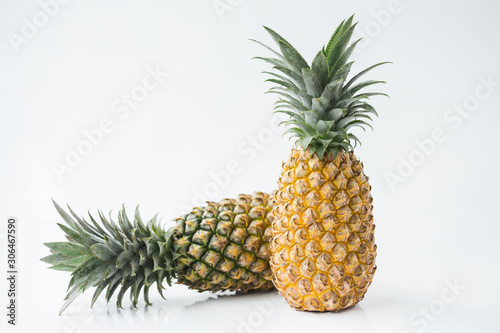 Fresh pineapples on the white background