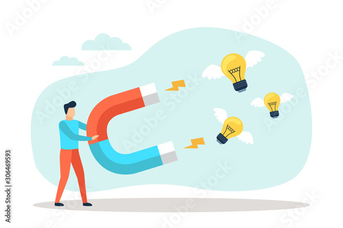 Businessman attract light bulbs with a large magnet