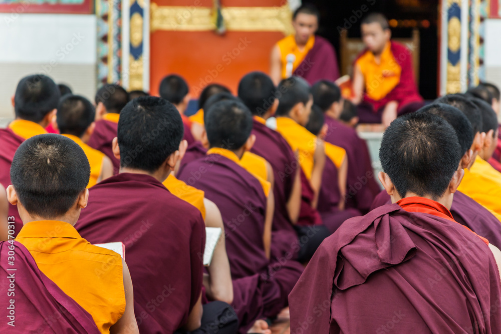 Buddhist Monks reading scripture in a monastery. Buddhist Monks reading scripture in a monastery.