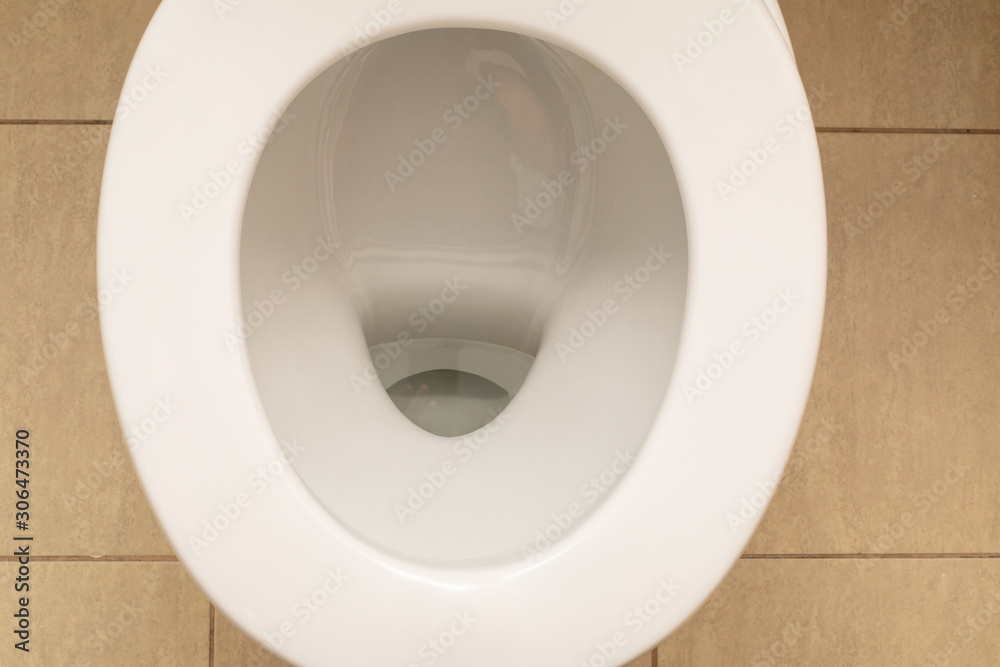 Fototapeta premium Toilet bowl at a bathroom