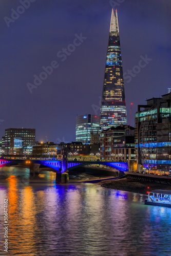 London skyline after sunset with the Shard and Southwark Bridge across Thames river with night lights on © SvetlanaSF