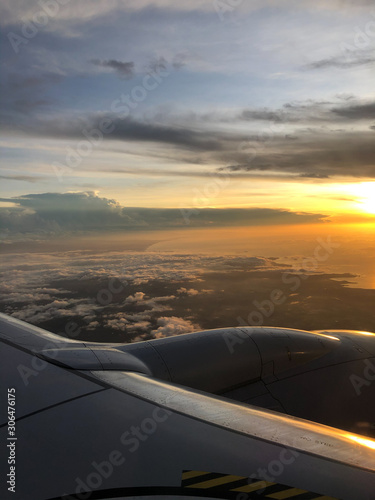 Beautiful View of a sunset in a plane window 