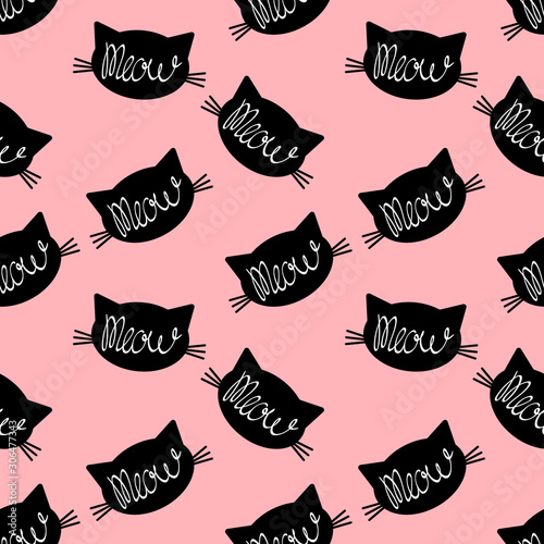 Photo Seamless pattern with black cat face silhouette with meow lettering inside