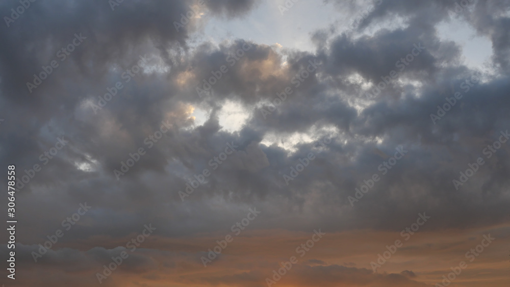 White cotton candy and Cumulus clouds on tropical blue sky at sunset, The horizon began to turn orange with purple and pink cloud at night, Dramatic cloudscape area