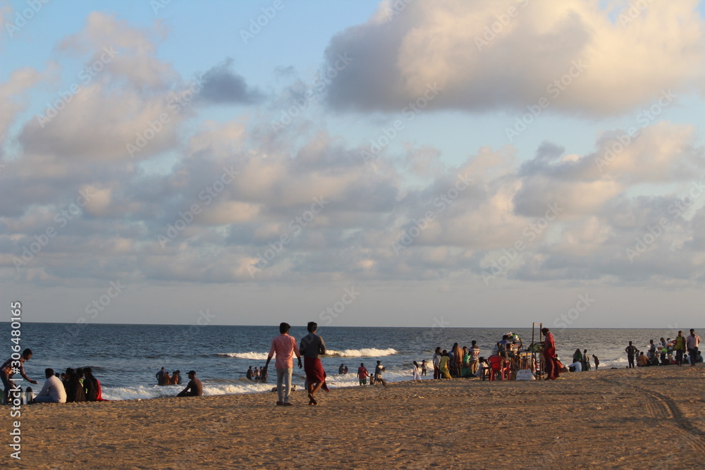 Chennai, Tamilnadu / India - November 25 2019: Chennai marina beach with lot of people enjoying the weekends with friends and families and also it polluted by them with trashes/dirt/garbage's/plastics Chennai, Tamilnadu / India - November 25 2019: Chennai marina beach with lot of people enjoying the weekends with friends and families and also it polluted by them with trashes/dirt/garbage's/plastics