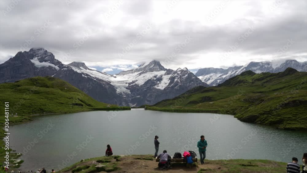 Timelapse Schreckhorn and Wetterhorn from Bachalpsee lake with cloudy, Bernese Oberland, Switzerland, Europe Timelapse Schreckhorn and Wetterhorn from Bachalpsee lake with cloudy, Bernese Oberland, Switzerland, Europe