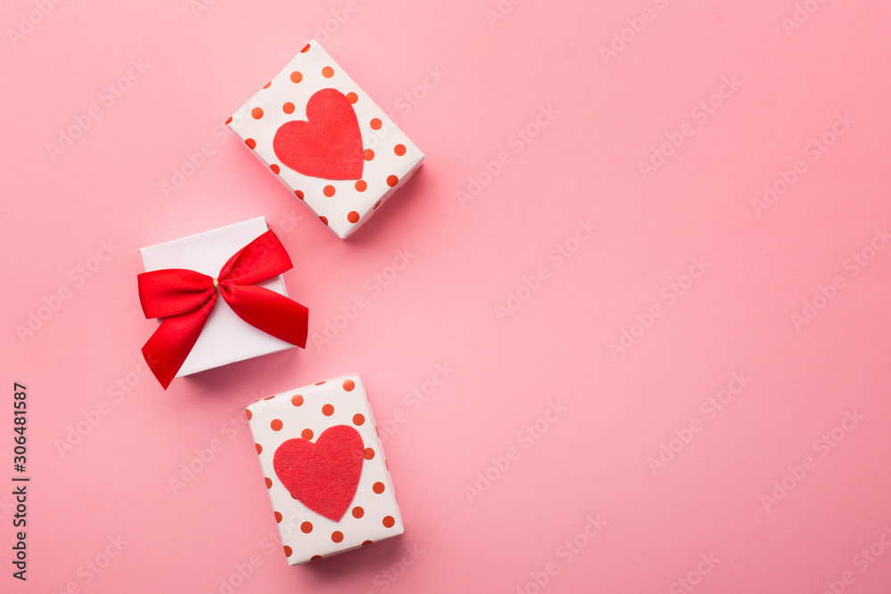 Valentines gift boxes, red bow and felt hearts