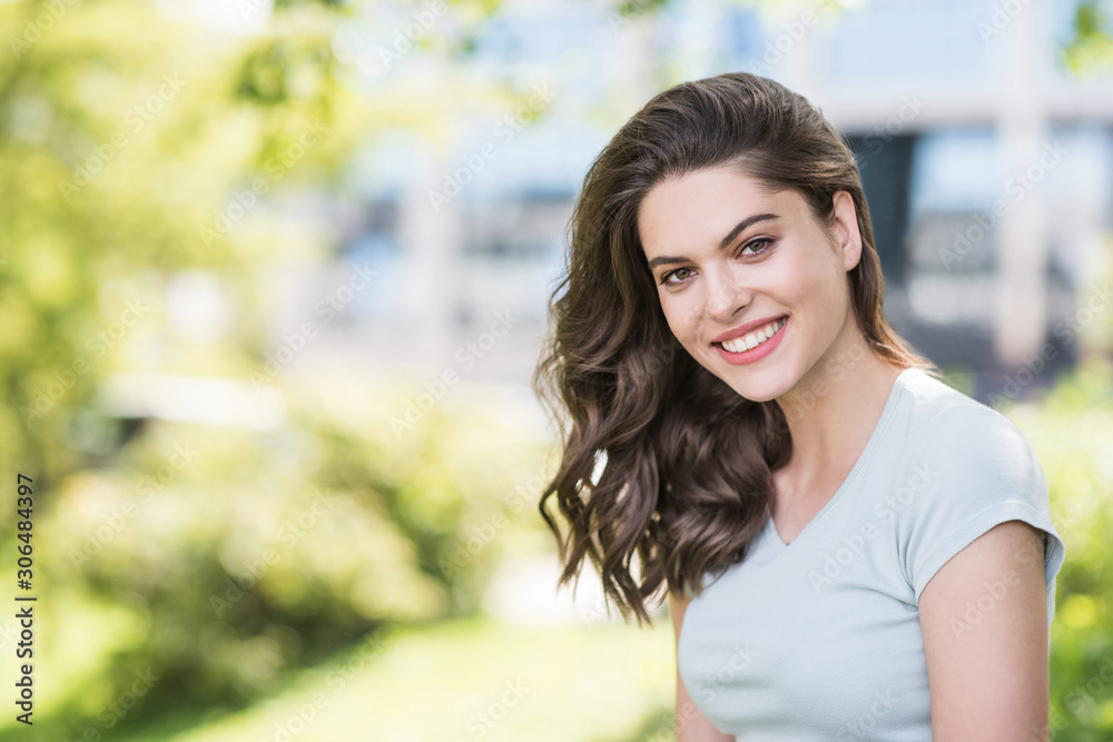 Beautiful happy young woman closeup portrait. Pretty model girl with perfect fresh clean skin smiling outdoors. Beauty, summer fun, enjoy life, people concept Beautiful happy young woman closeup portrait. Pretty model girl with perfect fresh clean skin smiling outdoors. Beauty, summer fun, enjoy life, people concept
