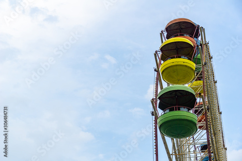 Brightly colored Ferris wheel photo