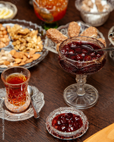 cornelian cherry jam served in crystal dish with tea