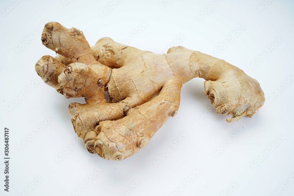 Ginger root isolated on light background. Healthy eating, weight loss, diet Ginger root isolated on light background. Healthy eating, weight loss, diet