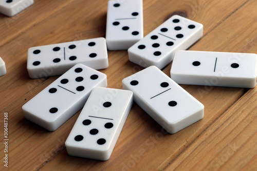Domino board game on the wooden table
