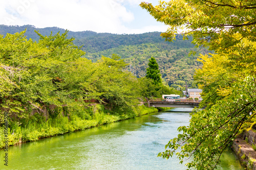 Okazaki-sosui waterway flowing near Heian-jingu Shrine. Sakyo Ward, Kyoto City, Japan photo