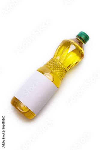 Vegetable oil in plastic bottle on white