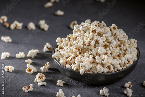 Homemade popcorn on the dark background