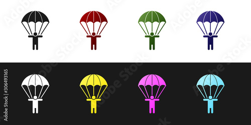 Set Parachute and silhouette person icon isolated on black and white background. Vector Illustration