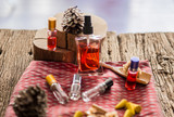 Rose perfume spray on the beautiful wooden table, aromatherapy, serum