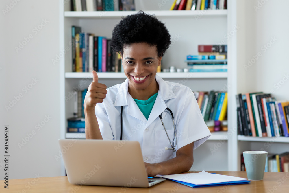 Laughing african american mature female doctor Laughing african american mature female doctor
