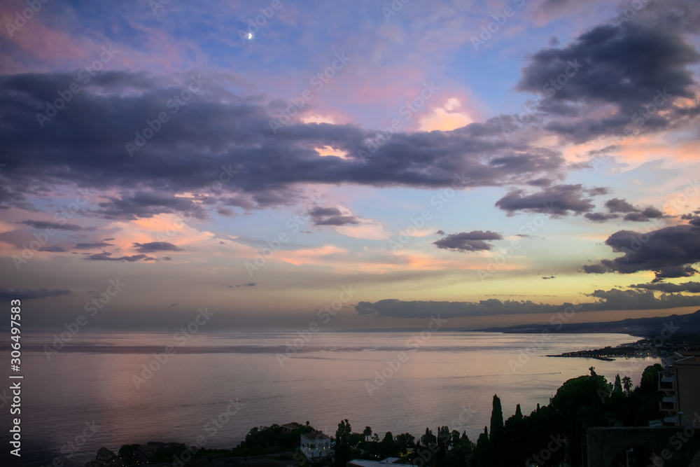 Sunset with a view in Taormina, Sicily, Italy Sunset with a view in Taormina, Sicily, Italy