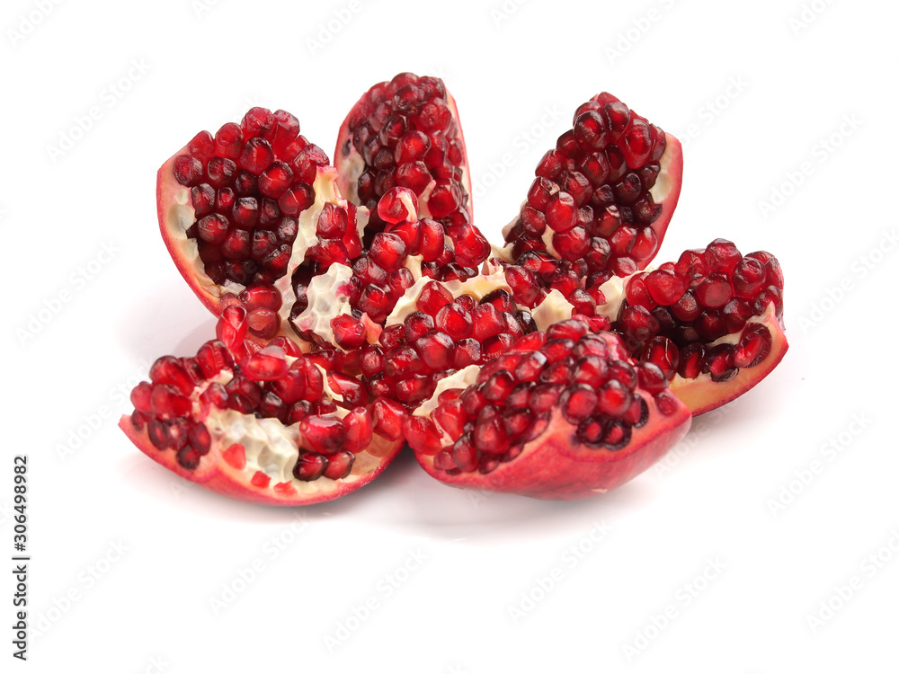 Ripe red pomegranate on a white background Ripe red pomegranate on a white background