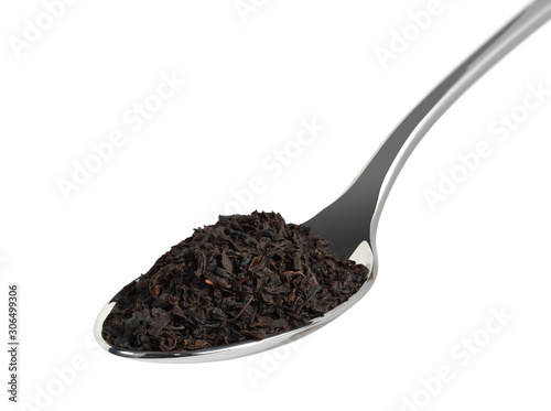 black tea in metal spoon isolated on white photo