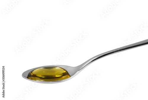 steel spoon with honey isolate on white.Entire image in sharpness.