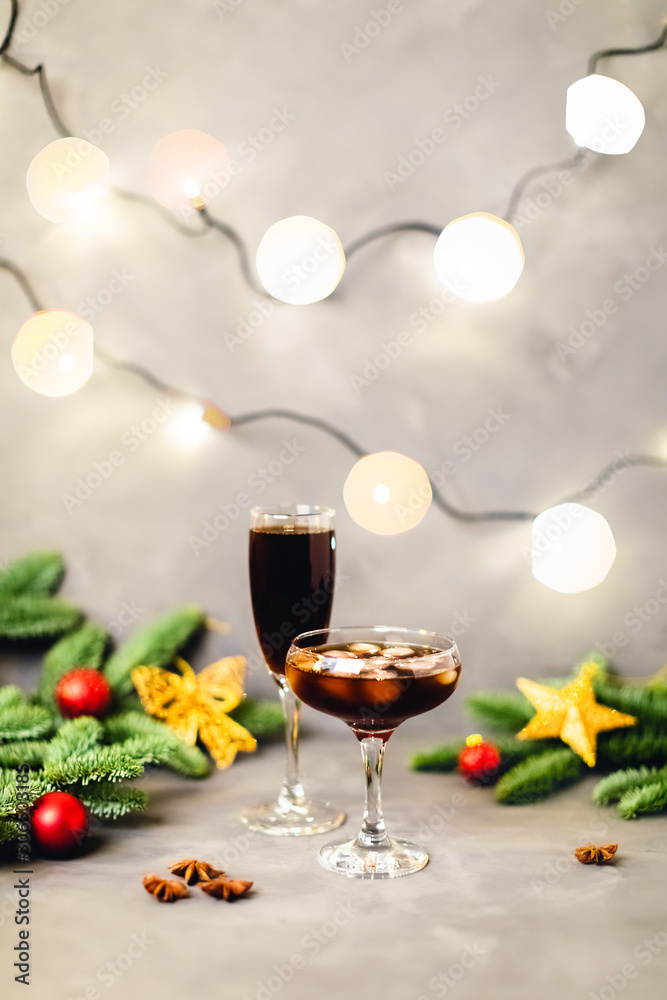 Christmas composition with lights and glasses. Christmas composition with lights and glasses.
