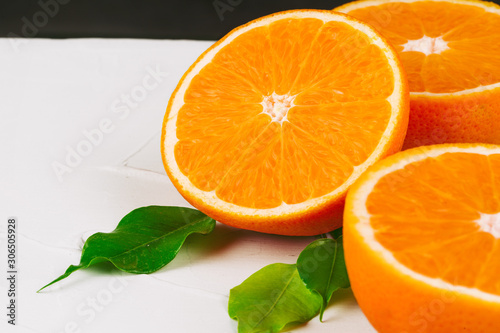 Sliced into pieces juicy ripe oranges close up © fotofabrika