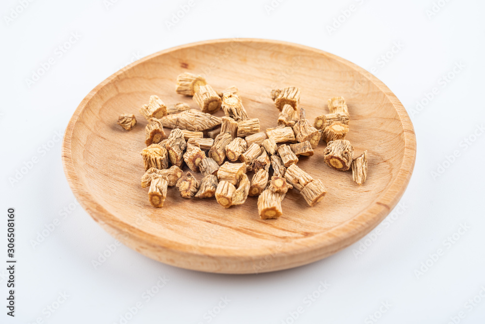 A pile of Chinese herbal medicine windbreak on white background A pile of Chinese herbal medicine windbreak on white background