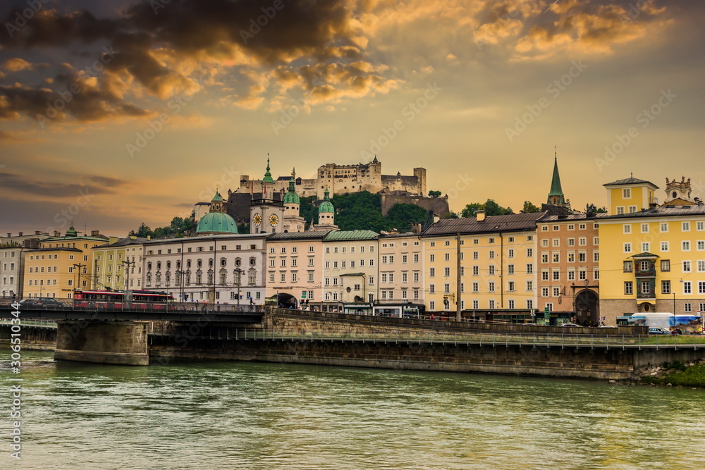 Beautiful view of Salzburg and Salzach river in sunset time, Austria.