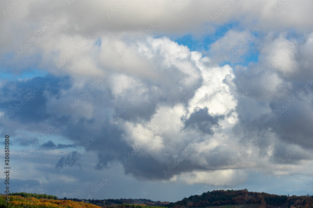 white and grey clouds in a blue sky white and grey clouds in a blue sky