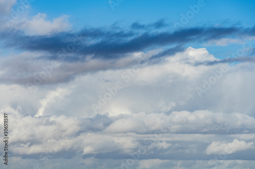 white and grey clouds in a blue sky