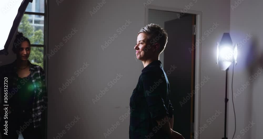 Model Under Studio Lights at Photo Shoot Model Under Studio Lights at Photo Shoot