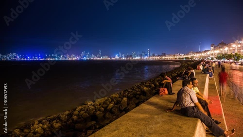 People enjoying their time at Marine Drive along the Arabian sea time lapse at night