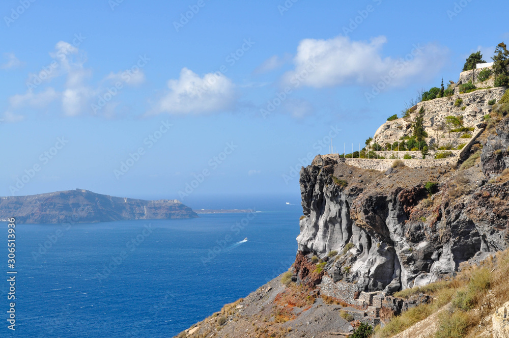 Rocks island of Santorini in the Aegean sea Rocks island of Santorini in the Aegean sea
