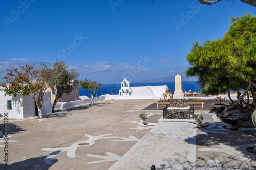 Monument and mini white church on the Santorini island