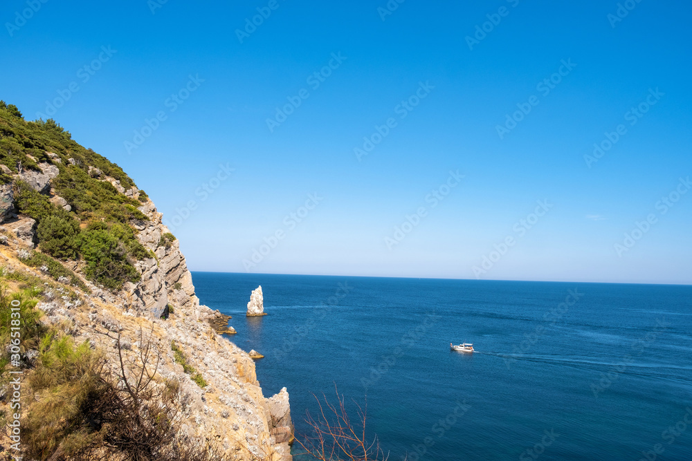 A high steep rocky coast on the southern coast of Crimea.