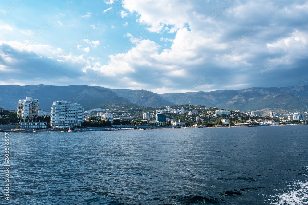 View from the sea to the city of Yalta on the southern coast of Crimea. View from the sea to the city of Yalta on the southern coast of Crimea.
