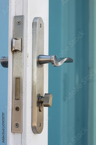 Detail of wooden door handles © naiauss