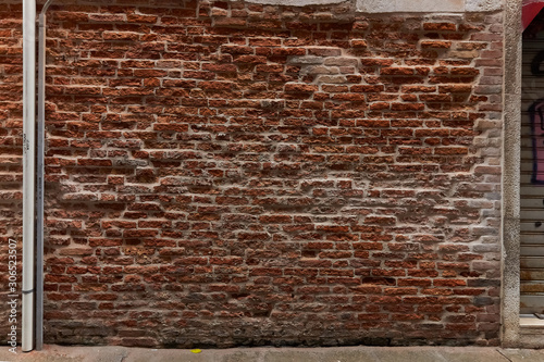 old terracotta brick wall in venice