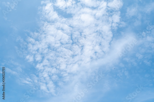 Beautiful white clouds and blue sky high definition skyscraper with grunge texture for background Abstract,nature art style,soft and blur focus.